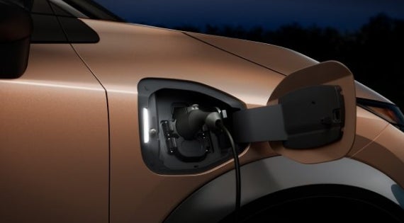 Close-up image of charging cable plugged in | LOUGHEAD NISSAN in Swarthmore PA